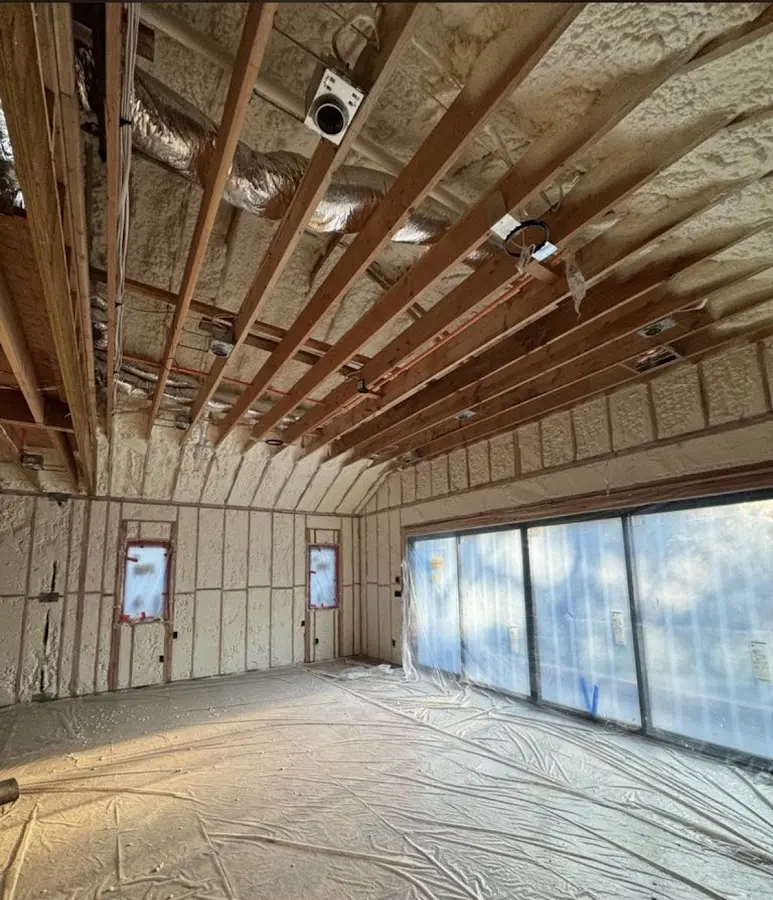 Interior walls and ceiling insulated with spray foam during new construction in Virginia